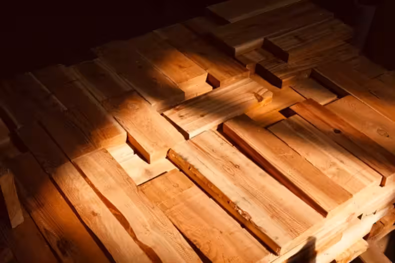 Stack of cut wooden planks